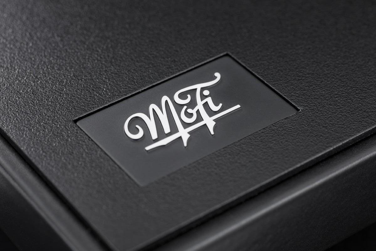 Detailed view of the materials used on UltraDeck's plinth featuring an embossed MoFi script logo.