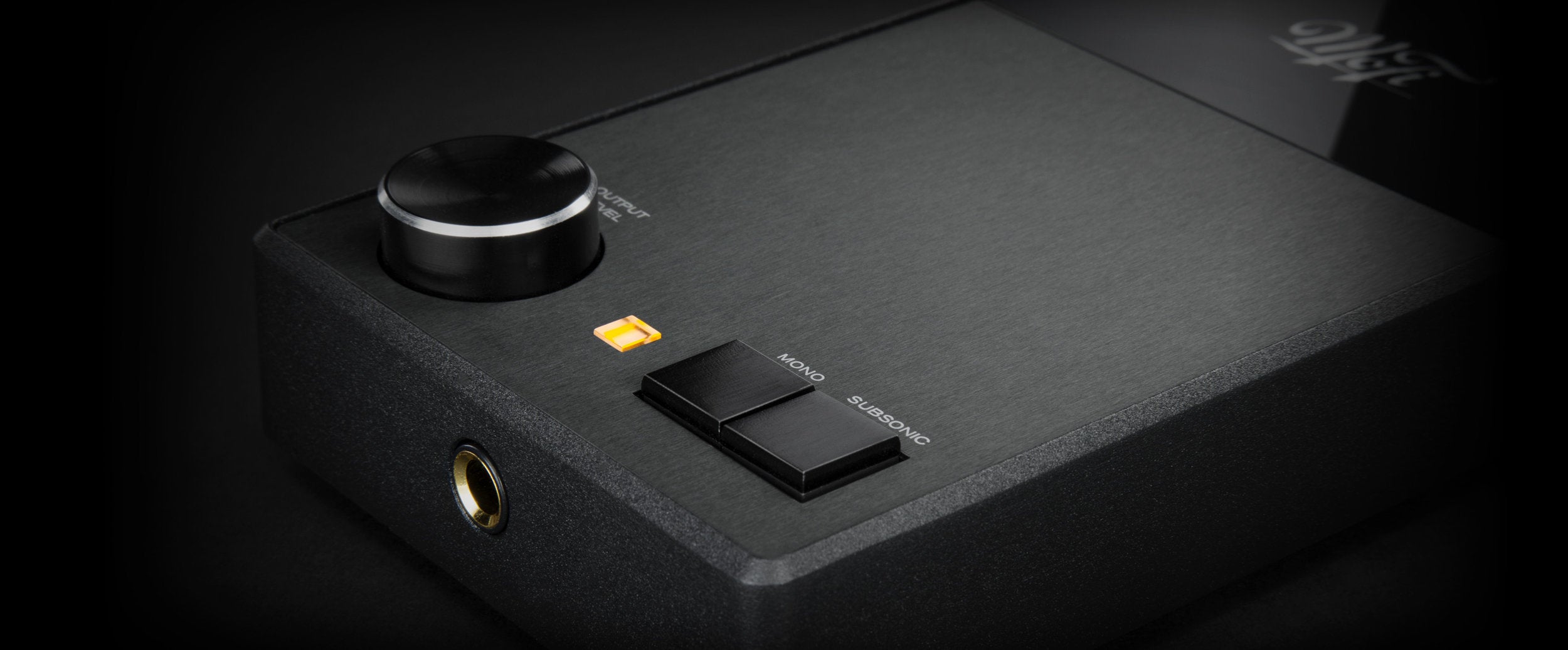 Detailed view of UltraPhono's volume knob, mono and subsonic buttons, and headphone jack.